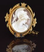 Victorian yellow metal brooch set with a cameo depicting a warrior, 13.2g, 4.5 x 4cm