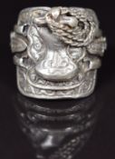 A hallmarked silver ring in the form of a saddle, 26g, size X