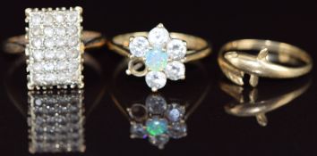 A 9ct gold ring set with spinel in a rectangular setting, 9ct gold ring in the form of a dolphin and