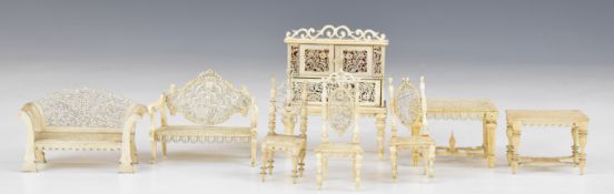 19th century carved bone possibly prisoner of war suite of doll's house furniture comprising bureau,