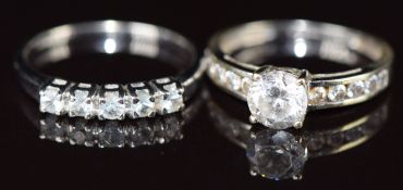 A 9k white gold ring set with five round cut aquamarines and a 9ct white gold ring set with paste,