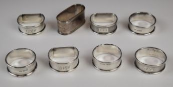 Eight Victorian and later hallmarked silver napkin rings including a pair, weight 118g