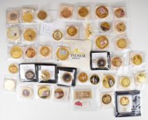 A collection of largely Royal commemorative gold plated picture coins including 40mm etc
