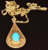 An 18ct gold pendant set with a turquoise cabochon (4.5cm) on 18ct gold chain, 16g, 60cm