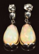 A pair of 18ct white gold earrings each set with a pear cut Ethiopian opal of approximately 9.5ct