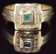 An 18ct gold ring set with an emerald and topaz, 3.6g, size U