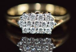 A 9k gold ring set with three rows of internally flawless diamonds, colour D, total diamond weight