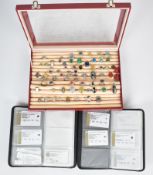 Seventy silver rings including malachite, pressed amber, spinel, amethyst, opal, quartz, garnet,