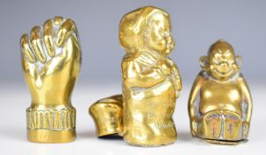 Three novelty vesta cases comprising Charles Mann Palace Hotel Aberdeen child holding a rattle,