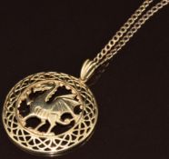 A 9ct gold pendant in the form of a Welsh dragon (3.5cm) on 9ct gold curb link chain / necklace, 9g,