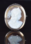 A c1900 9ct gold brooch set with a cameo of a woman, 6.7g, 3 x 3.8cm