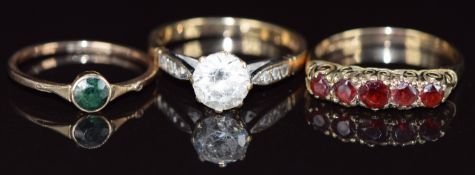 Three 9ct gold rings set with cubic zirconia, garnets and tourmaline, 6.2g, sizes O, L & P