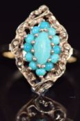 A 9ct gold ring set with turquoise in a marquise shaped setting, 3.7g, size L