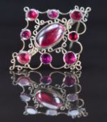 Georgian / Victorian brooch set with a foiled garnet cabochon and foiled round cut garnets, 5g, 4.