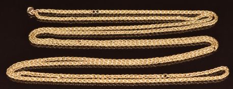 A yellow metal necklace / guard chain made up of textured oval twisted links, marked 18C, 154cm