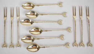 Set of twelve 800 grade continental silver spoons and forks, each with twisted handles and a thistle