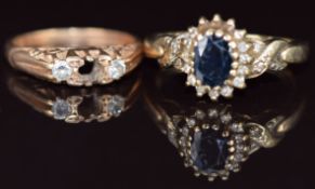 A 9ct gold ring set with a sapphire surrounded by diamonds, and a 9ct gold ring, 6.3g, sizes N & H