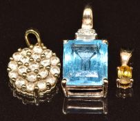 Three 9ct gold pendants, one set with champagne diamonds, one blue topaz and one citrine, 5.5g,