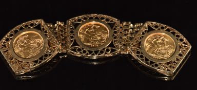 A 9ct gold bracelet set with three 1974 gold full sovereigns, 55.7g, 18cm