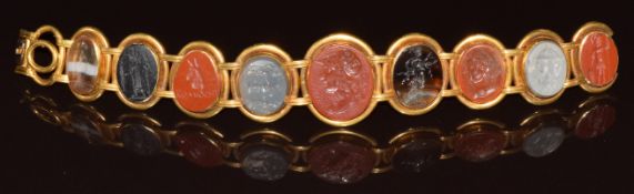 Early 19thC gold bracelet set with nine intaglio seals, each carved with portraits, figures or