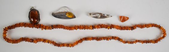 Two Danish silver brooches, one by Wrich and one possibly Hermann Siersbol, a silver pendant set