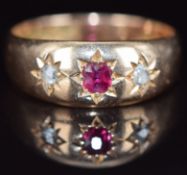 A 15ct gold ring set with a ruby and two rose cut diamonds, Birmingham 1896, 4.5g, size P