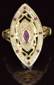 An 18ct gold ring set with rubies and paste in a marquise setting, 7g, size V