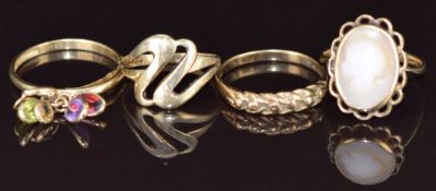 Four 9ct gold rings, including one set with a cameo and one garnet, amethyst, citrine and peridot,