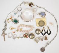 A collection of silver jewellery including bangle, nine rings, brooch, cross pendant and chain,