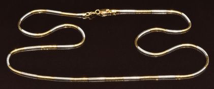 An 18k gold bi-coloured snake chain, 10.7g, 50cm