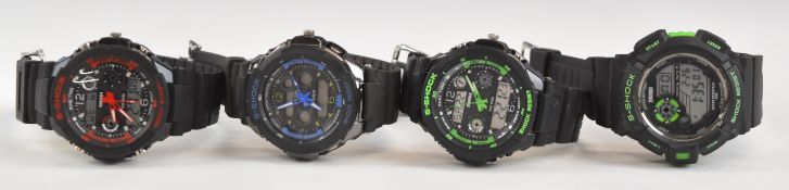 Four SKMEI S-Shock Casio G-Shock style gentleman's wristwatches comprising two black and green,