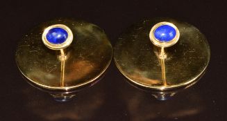 A pair of 14k gold studs with cut out Maria Theresia coin decoration and set with lapis lazuli, 39.