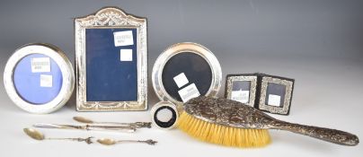 Four hallmarked silver photograph frames to include a small double example, height of tallest