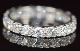A platinum eternity ring set with diamonds, each approximately 0.08ct, 4.1g, size N