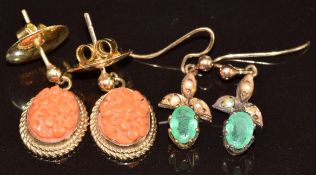 A pair of 9ct gold earrings set with carved coral and a pair of Edwardian earrings each set with