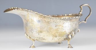 George V hallmarked silver sauce boat with beaded edge, raised on three hoof feet, Sheffield 1915,