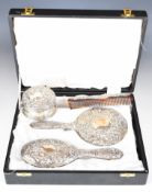 Cased Elizabeth II hallmarked silver dressing table set comprising hand mirror, brush and comb,