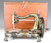 Jones hand cranked sewing machine, in case with toolbox