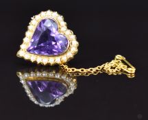 Edwardian 9ct gold brooch in the form of a heart set with an amethyst surrounded by seed pearls, 4.