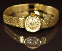 Omega 18ct gold ladies wristwatch ref. 644.638 with black hands, gold and black baton hour