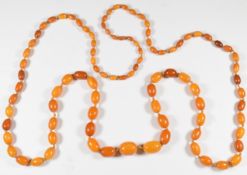 Baltic amber necklace made up of 98 graduated oval beads, the largest 14.4 x 18.4mm and smallest 5.5