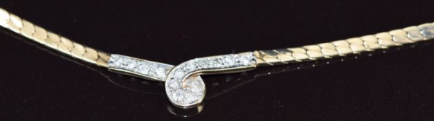 A 9ct gold necklace set with diamonds in a twist setting, 13.6g, 42cm