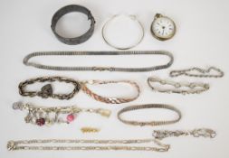 A collection of silver jewellery including bangles, fob watch, necklaces, bracelets, charm bracelet,