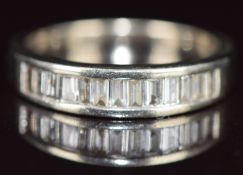 A 9ct white gold ring set with baguette cut diamonds, 2.9g, size N