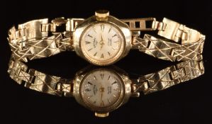 Rotary 9ct ladies wristwatch with gold hands and hour markers, silver dial and 17 jewel movement, on