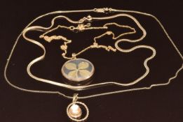 A 9ct gold locket set with a four leaf clover, on 9ct gold chain, a 9ct gold pendant set with a