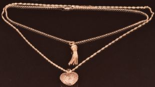 A 9ct rose gold chain with 9ct rose gold tassel pendant and a 9ct rose gold heart pendant on