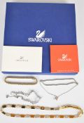 Two Swarovski bracelets, Swarovski necklace and a silver bracelet set with synthetic rubies