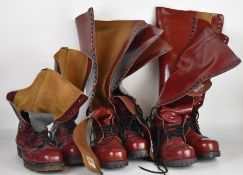 Three pairs of vintage twenty and thirty hole oxblood boots, one Dr Martens the others Underground