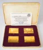 Cased set of four hallmarked silver gilt limited edition (2582/5000) commemorative stamps by